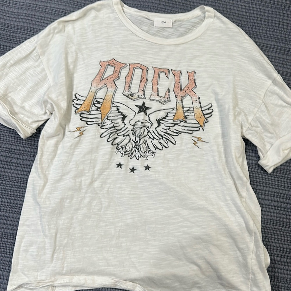 12PM graphic T with cute rock design
